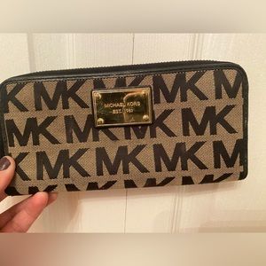 Michael Kors logo wallet.